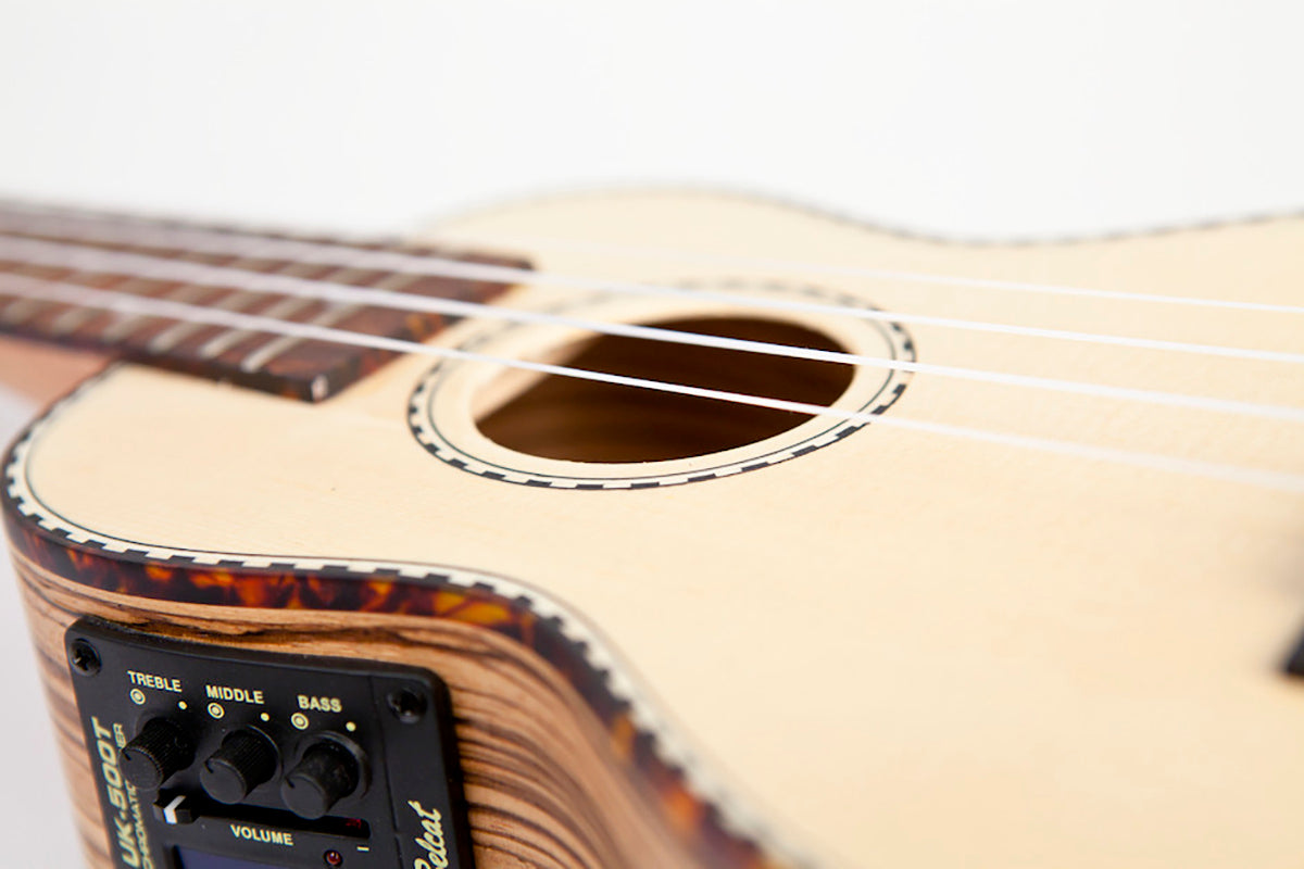 Reno RU210E Sopraano Ukulele, jossa on äänenvahvistin ja viritin (luonnonväri)